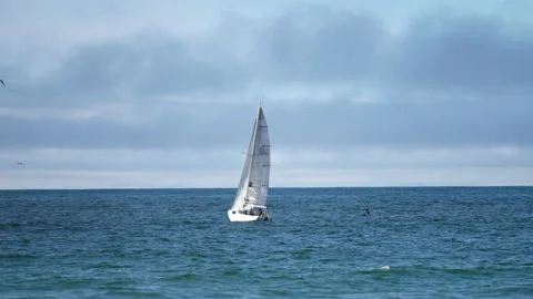 Sailing boat in a cloudy sky Video stock 236532529