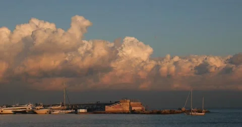 Sailing Boat Going To The Harbour At Sunset In Barcelona 4K Stock Footage 131566352