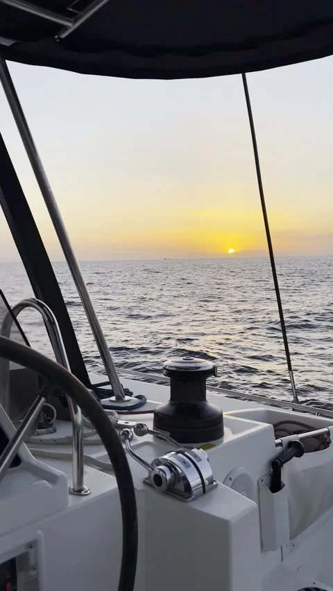 Sailing Boat Helm with Sunset Over Open Sea in Greece Stock Footage 336965019