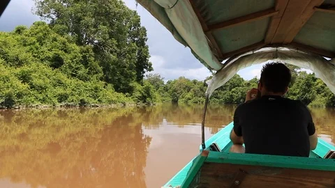 Sailing in a boat in the jungle Stock Footage 103430191