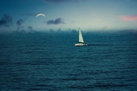 Sailing boat with moon in the background Stock Photos