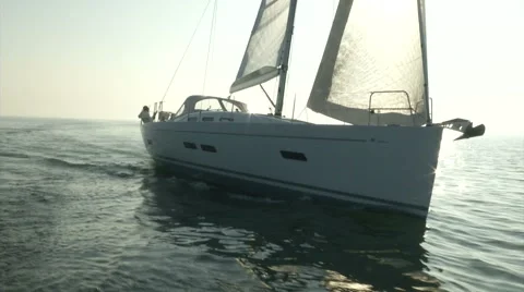 Sailing boat navigating with open sails Stock Footage 68458250