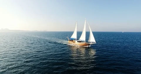 Sailing boat navigating with open sails in the sea Stock Footage 84940025