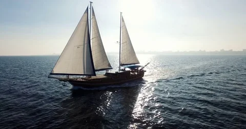 Sailing boat navigating with open sails in the sea Stock Footage 84940400