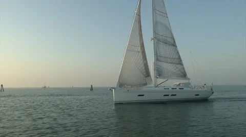Sailing boat navigating slowly with open sails Stock Footage 68458315