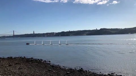 Sailing boat navigating in Tejo River Stock Footage 145990106