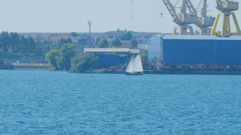 Sailing boat in an old harbor Stock Footage 291387363