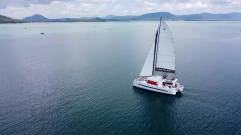 Sailing boat with open sails sails on the sea Stock Footage 167789232