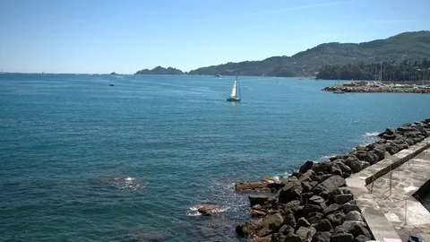 Sailing boat returning to the port of Rapallo. Stock Footage 79656590
