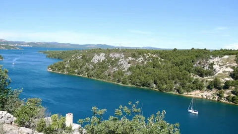 Sailing boat on the river Krka going to the sea Stock Footage 94811944