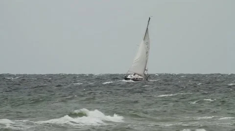 Sailing boat on rough sea Stock Footage 45987899