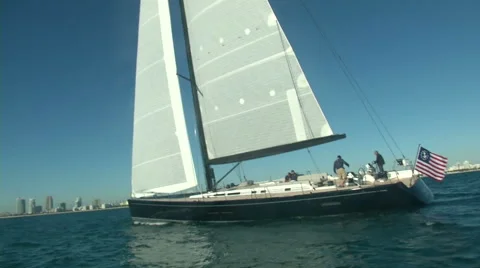 Sailing boat slowly navigating close to the coast in Miami  Stock Footage 43318671