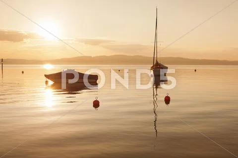 Sailing boat at sunset, Lake Constance, near Konstanz, Baden-Wurttemberg, Stock Photos