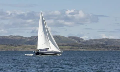 Sailing boat turning in the wind Stock Photos