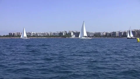 Sailing boats on a background of Athens 스톡 동영상 84381247