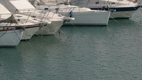 Sailing boats moored in the harbour Stock Footage 90754452
