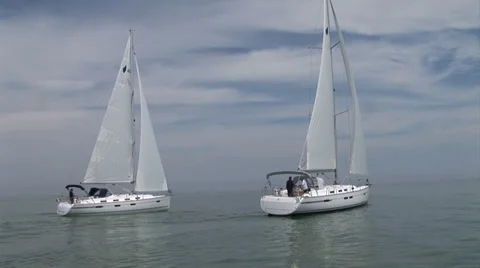 Sailing boats navigating with open sails Stock Footage 36176524