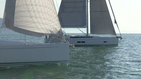 Sailing boats with open sails Stock Footage 32324735