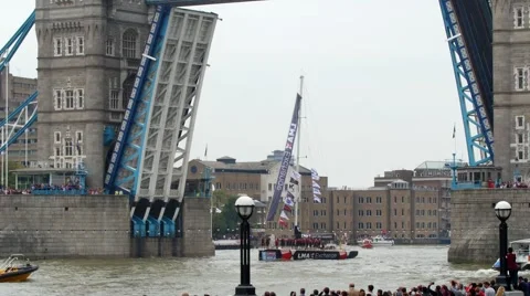 Sailing boats parading under tower bridge in London Stock Footage 56581963