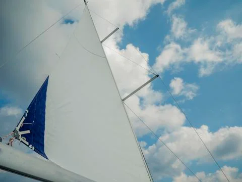 Sailing boats sails with clouds in background. Stock Photos