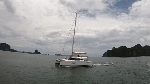 Sailing catamaran on the high seas Stock Footage 167850516