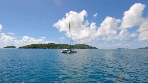 Sailing catamarans in the ocean in the Seychelles Stock Footage 155797012
