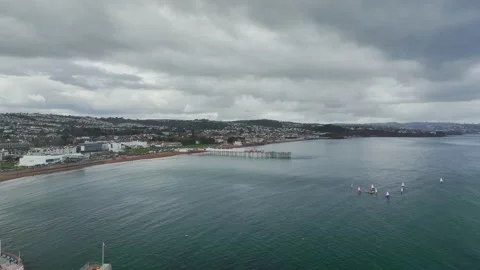 Sailing Club training at cloudy sky from a drone, Paignton, Devon, UK Stock Footage 236330115