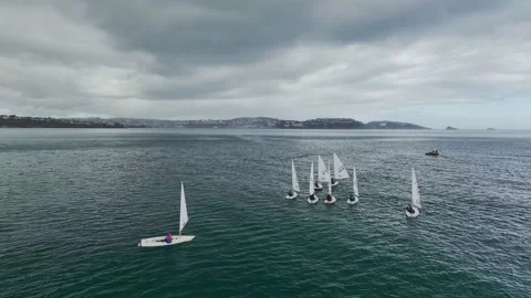 Sailing Club training at cloudy sky from a drone, Paignton, Devon, UK 스톡 동영상 236330127