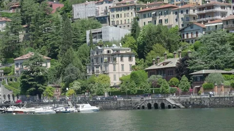 Sailing on the Como lake in a sunny spring day Stunning Como town Stock Footage 154458926