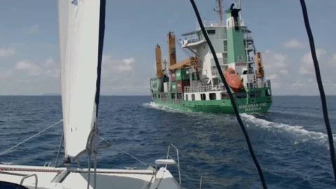 Sailing containership overtake Stock Footage 149646515