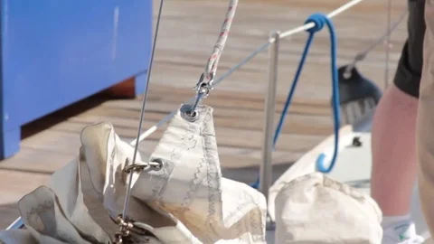 Sailing crew prepping sails Stock Footage 77333562