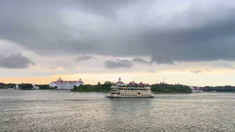 Sailing day in the lake in a cloudy day trip from epcot to magic kingdom Stock Footage 219941482