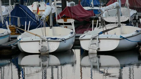 Sailing dinghies in the harbor Stock Footage 29664831