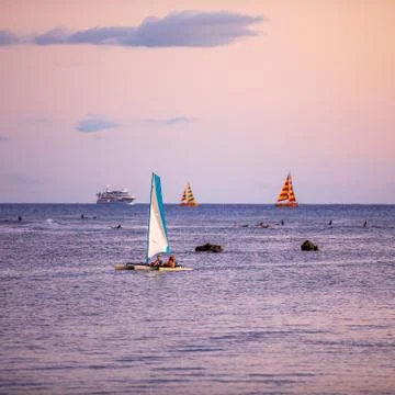 Sailing at dusk Stock Photos