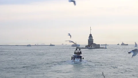 Sailing in front of Kiz Kulesi light house in Istanbul Stock Footage 86408929
