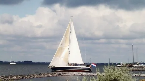 Sailing on the Grevelingen with full equipment Stock Footage 85572652