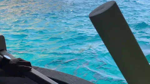 Sailing inside of the blue grotto in capri on a wooden local boat 库存影片 203405945