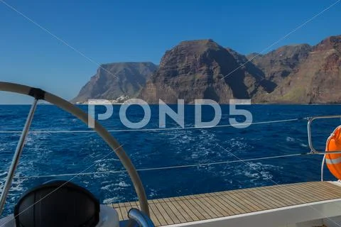 Sailing on luxury yacht in Atlantic ocean near La Gomera Island in Spain. Vie Stock Photos