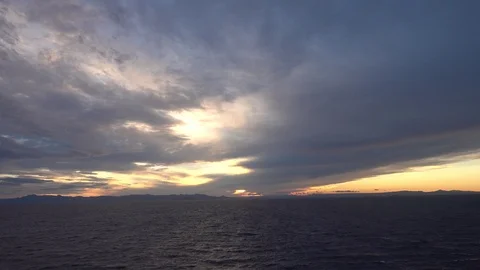 Sailing the Mediterranean at sunset Stock Footage 100040126