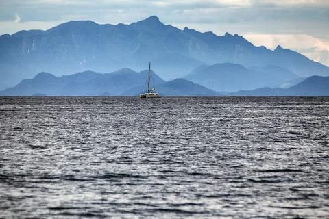 Sailing with the mountains Stock Photos