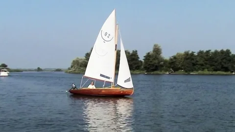 Sailing in open sailboat 16 m2 Stock Footage 85572593