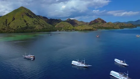 Sailing phinisi boats, pristine tropical paradise. Best aerial view drone Stock-Footage 344619499