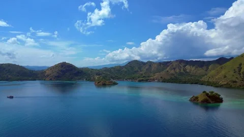 Sailing phinisi boats, pristine tropical paradise. Lovely aerial view drone Stock-Footage 344627547