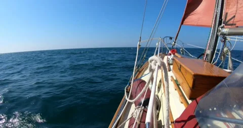 Sailing in Rolling Waves Clear Blue Sky and Water Stock Footage 161082325