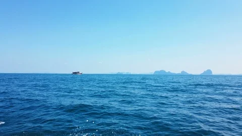 Sailing by sea with islands on background Stock Footage 104767653
