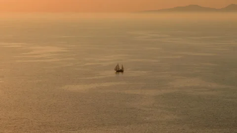 Sailing in the sea at sunset Stock Footage 220220835