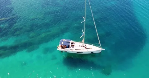 Sailing on Serene Blue Waters With a View of Shadows Below the Surface in a Stock Footage 316166405