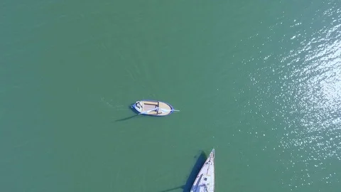 A sailing ship is in the calm waves of the ocean in calm weather Stock Footage 86429360