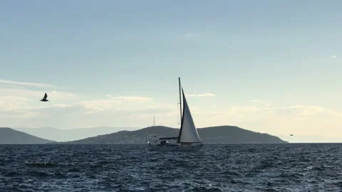 Sailing ship in the cloudy sea Stock Footage 145912441