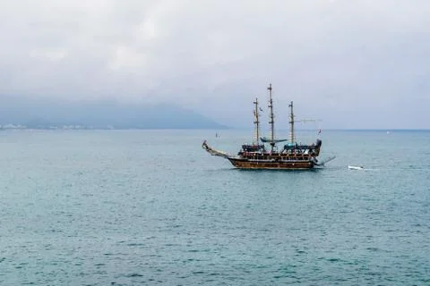 Sailing ship floating in the sea Stock Photos